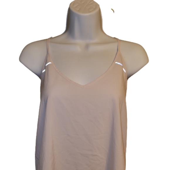 Lululemon Breezy Singlet Tank Top In a Very Light Pink Shade Size Medium no dot - Picture 10 of 13